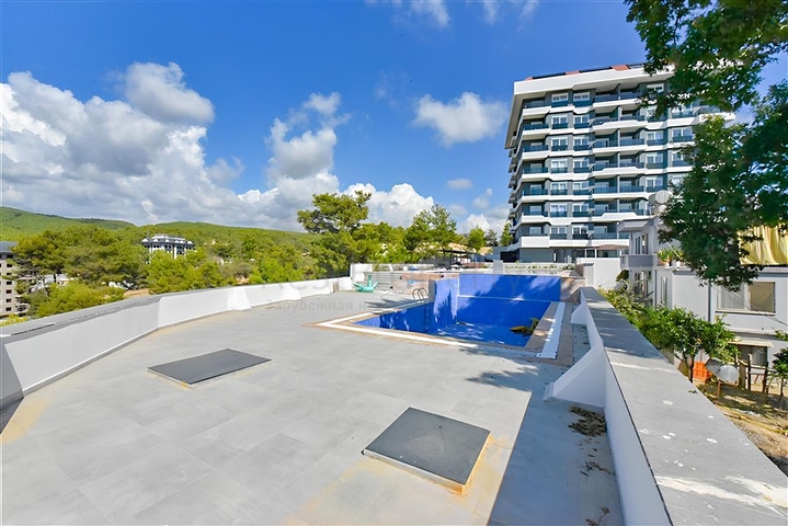 1+1 apartment in a new complex in Avsallar district