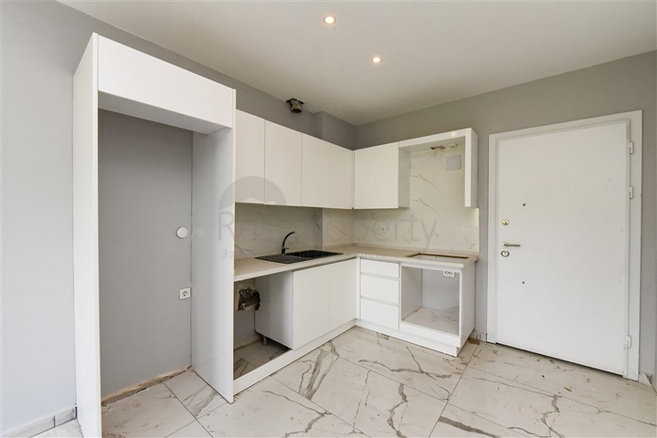 1+1 apartment in a new complex in Avsallar district