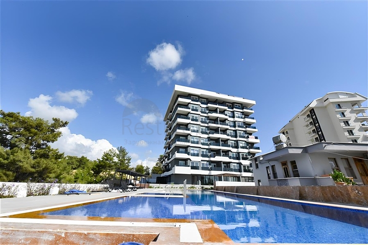 1+1 apartment in a new complex in Avsallar district