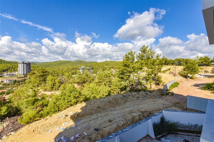 1+1 apartment in a new complex in Avsallar district