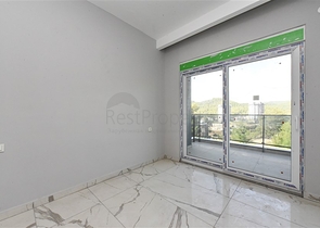 1+1 apartment in a new complex in Avsallar district