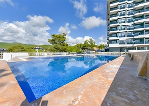 1+1 apartment in a new complex in Avsallar district