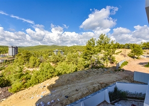 1+1 apartment in a new complex in Avsallar district