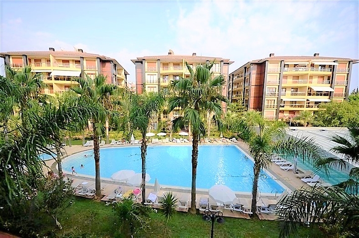 Apartment in a complex on the first coastline with its own private beach