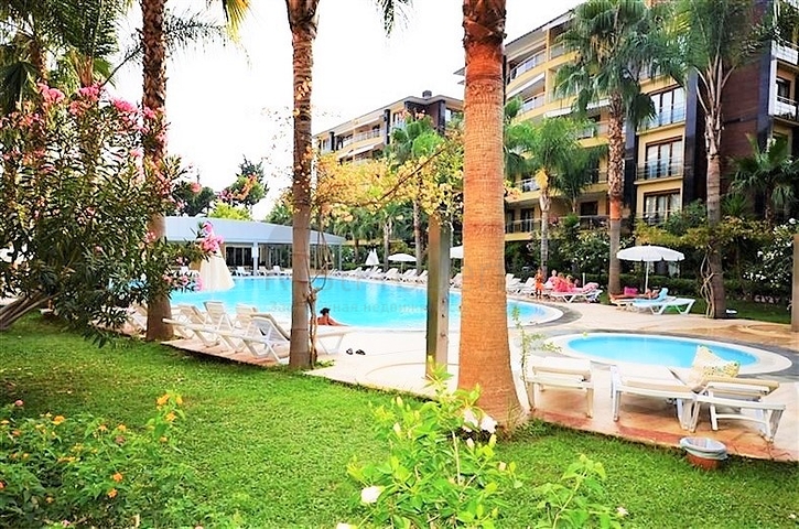 Apartment in a complex on the first coastline with its own private beach