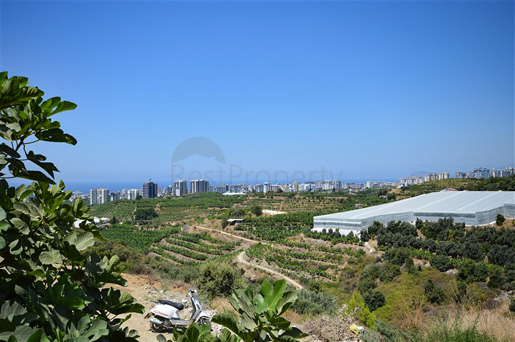 Villa in sita 4+1 with a small garden and sea and mountain views in the picturesque Kargicak area