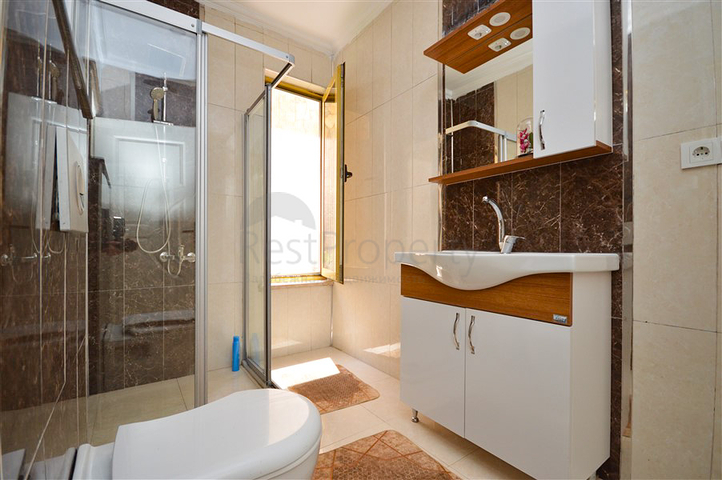 Villa in sita 4+1 with a small garden and sea and mountain views in the picturesque Kargicak area