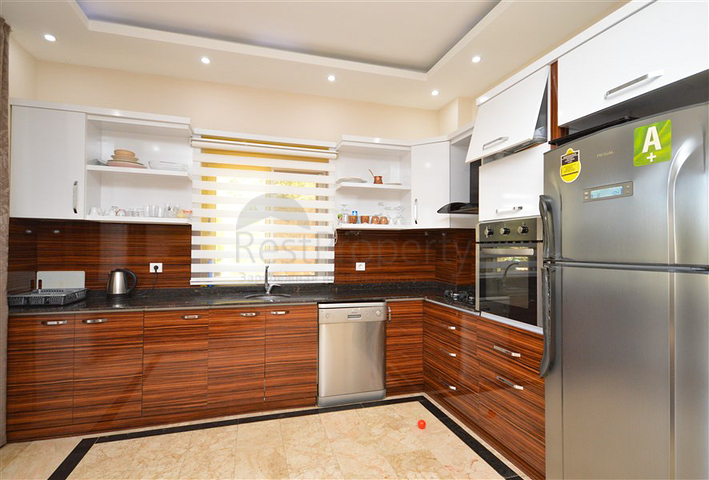 Villa in sita 4+1 with a small garden and sea and mountain views in the picturesque Kargicak area