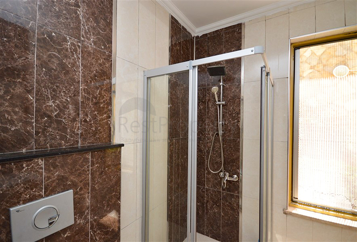 Villa in sita 4+1 with a small garden and sea and mountain views in the picturesque Kargicak area