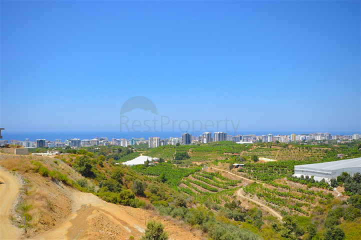 Villa in sita 4+1 with a small garden and sea and mountain views in the picturesque Kargicak area
