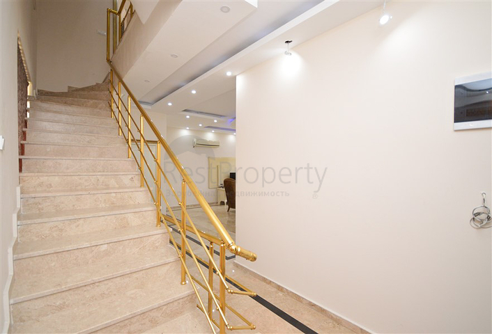 Villa in sita 4+1 with a small garden and sea and mountain views in the picturesque Kargicak area