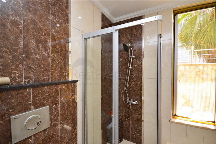 Villa in sita 4+1 with a small garden and sea and mountain views in the picturesque Kargicak area