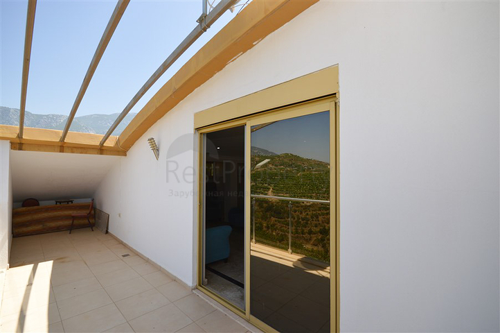 Villa in sita 4+1 with a small garden and sea and mountain views in the picturesque Kargicak area