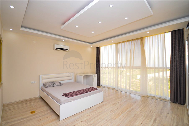 Villa in sita 4+1 with a small garden and sea and mountain views in the picturesque Kargicak area