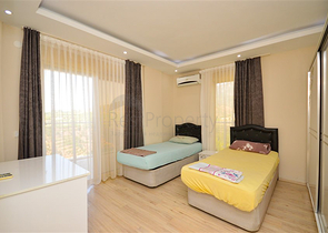 Villa in sita 4+1 with a small garden and sea and mountain views in the picturesque Kargicak area