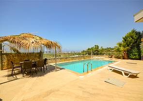 Villa in sita 4+1 with a small garden and sea and mountain views in the picturesque Kargicak area