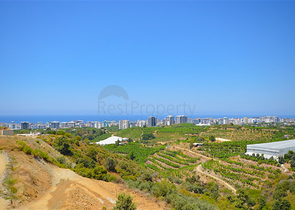 Villa in sita 4+1 with a small garden and sea and mountain views in the picturesque Kargicak area