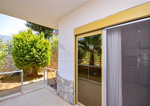 Villa in sita 4+1 with a small garden and sea and mountain views in the picturesque Kargicak area