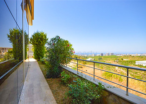 Villa in sita 4+1 with a small garden and sea and mountain views in the picturesque Kargicak area