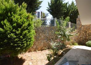 Villa in sita 4+1 with a small garden and sea and mountain views in the picturesque Kargicak area