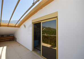 Villa in sita 4+1 with a small garden and sea and mountain views in the picturesque Kargicak area