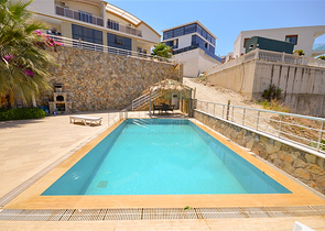 Villa in sita 4+1 with a small garden and sea and mountain views in the picturesque Kargicak area