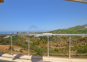 Villa in sita 4+1 with a small garden and sea and mountain views in the picturesque Kargicak area
