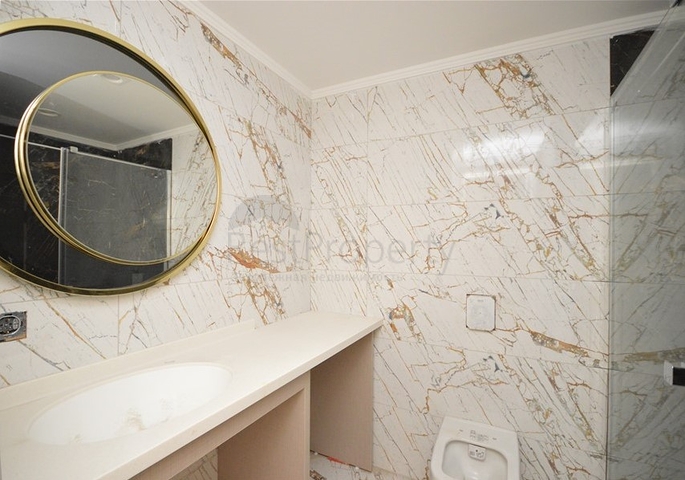 1+1 apartment in a premium class complex on the first coastline in Mahmutlar