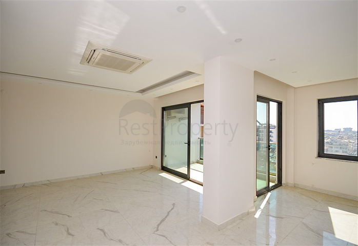 3+1 duplex penthouse with closed parking and sea view in Alanya
