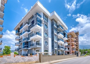 1+1 apartment in a new complex in Mahmutlar