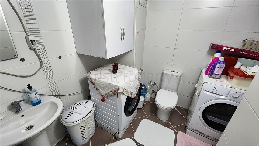 A 3+1 apartment in the Guzelbag - Antalya neighborhood 