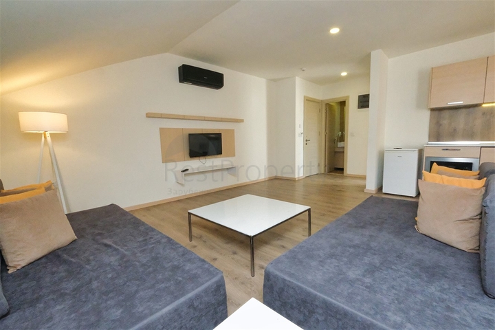 A 2+2 apartment in the Persimmon - Antalya neighborhood 