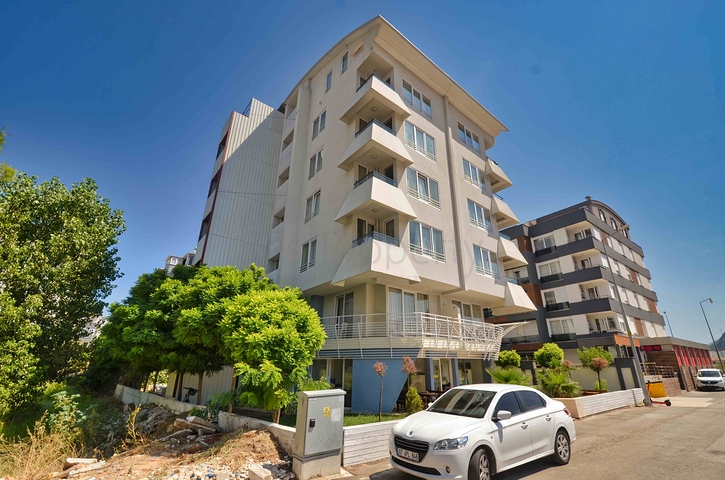 A 2+2 apartment in the Persimmon - Antalya neighborhood 