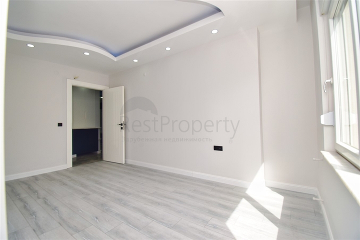 A 3+1 apartment in the Kyzyltoprak - Antalya neighborhood 