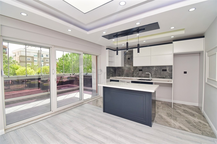 A 3+1 apartment in the Kyzyltoprak - Antalya neighborhood 