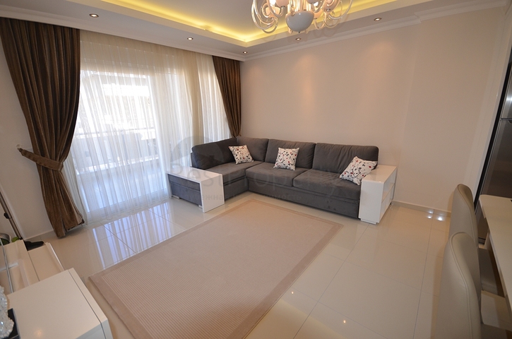 Large 1+1 apartment in the center of Oba district, just 100 meters from the sea 