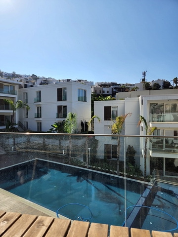 4+1 penthouse in a complex on the first coastline in the beautiful bay of Kucukbuk, Bodrum