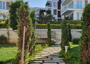 4+1 penthouse in a complex on the first coastline in the beautiful bay of Kucukbuk, Bodrum