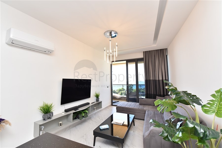 1+1 apartment with sea view in a new complex