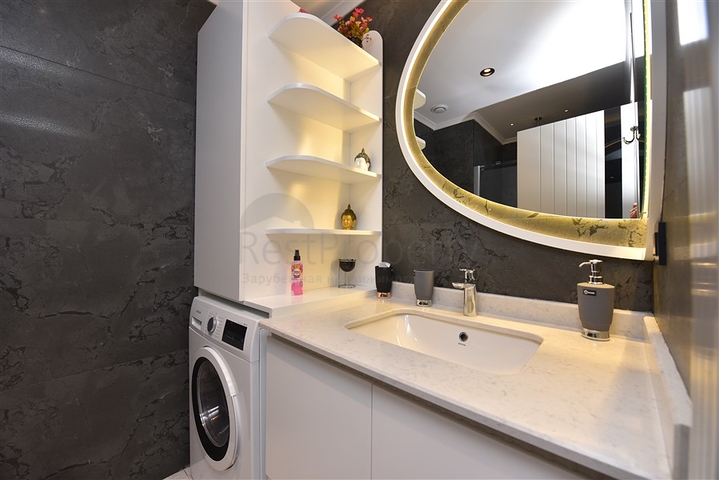 1+1 apartment with sea view in a new complex