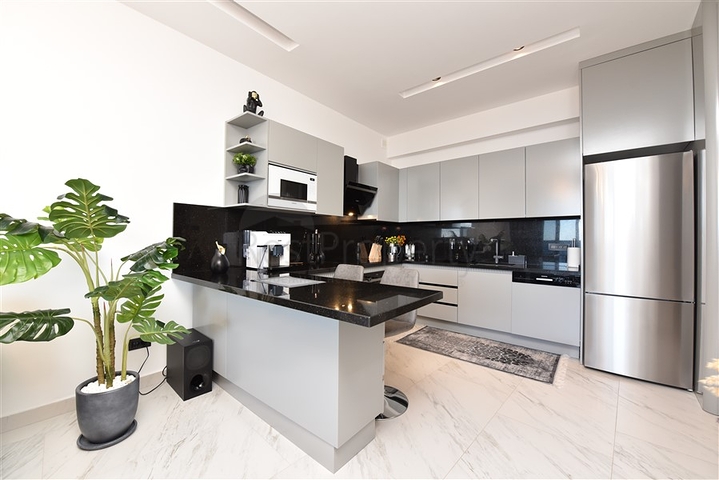 1+1 apartment with sea view in a new complex