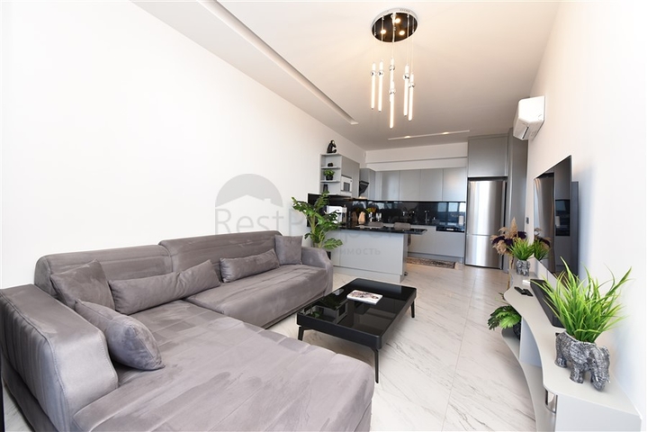 1+1 apartment with sea view in a new complex