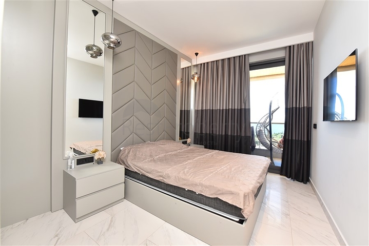 1+1 apartment with sea view in a new complex