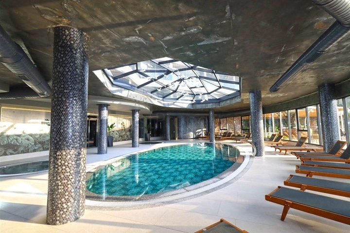 1+1 apartment with sea view in a new complex