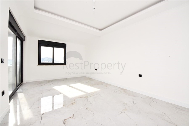 3+1 apartment in a new complex with sea view and Alanya fortress