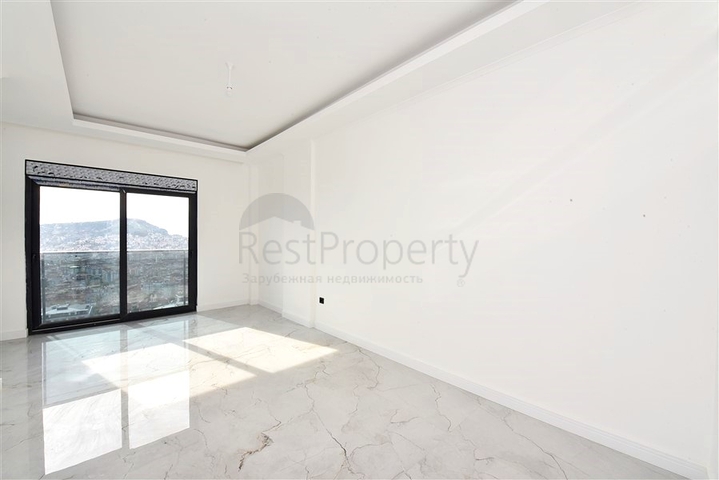 3+1 apartment in a new complex with sea view and Alanya fortress