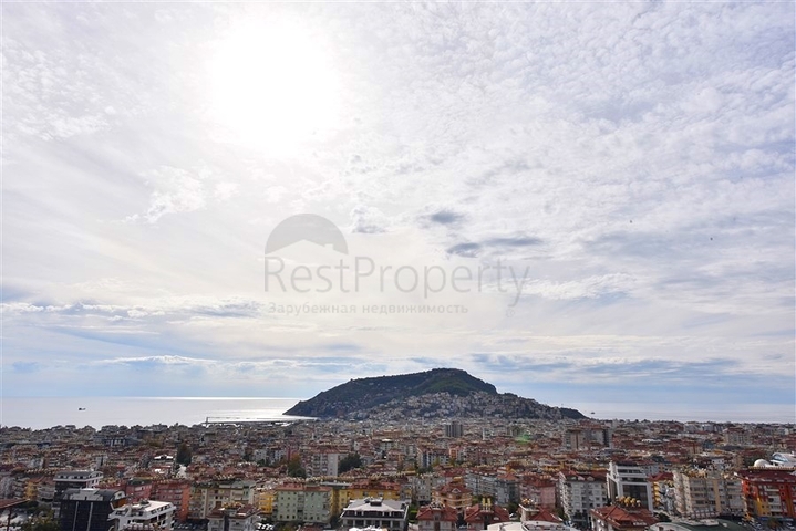 3+1 apartment in a new complex with sea view and Alanya fortress