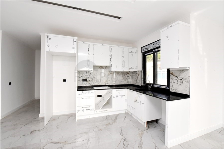 3+1 apartment in a new complex with sea view and Alanya fortress