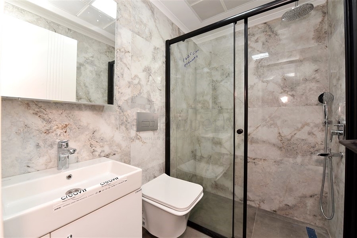 3+1 apartment in a new complex with sea view and Alanya fortress