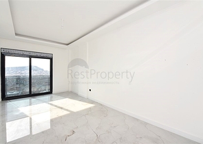 3+1 apartment in a new complex with sea view and Alanya fortress